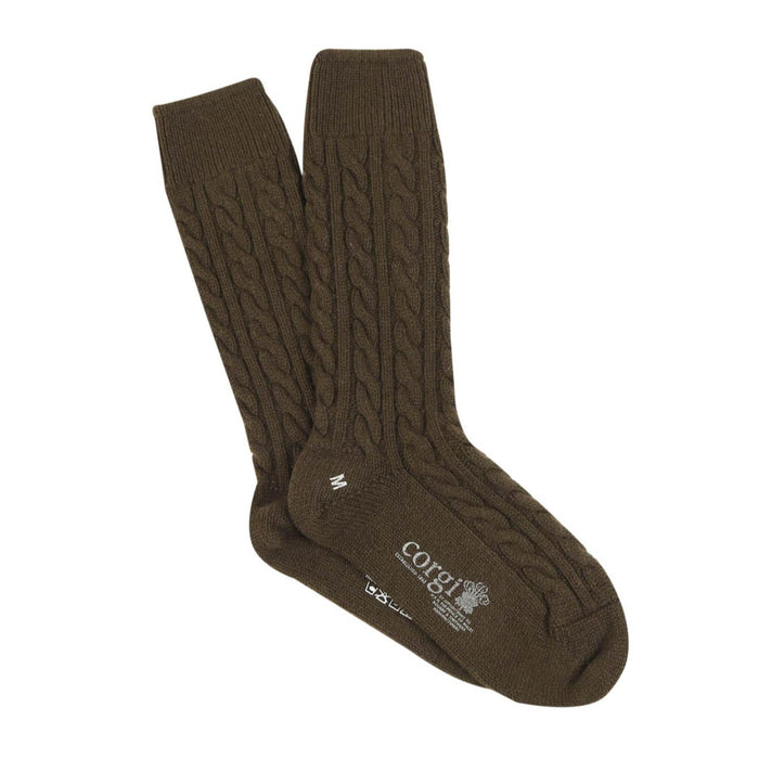 A pair of loden green cashmere socks with a cable knit pattern, displayed against a white background.